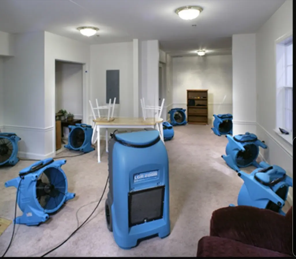 Air movers and dehumidifier setup for Water Damage Restoration in Denville